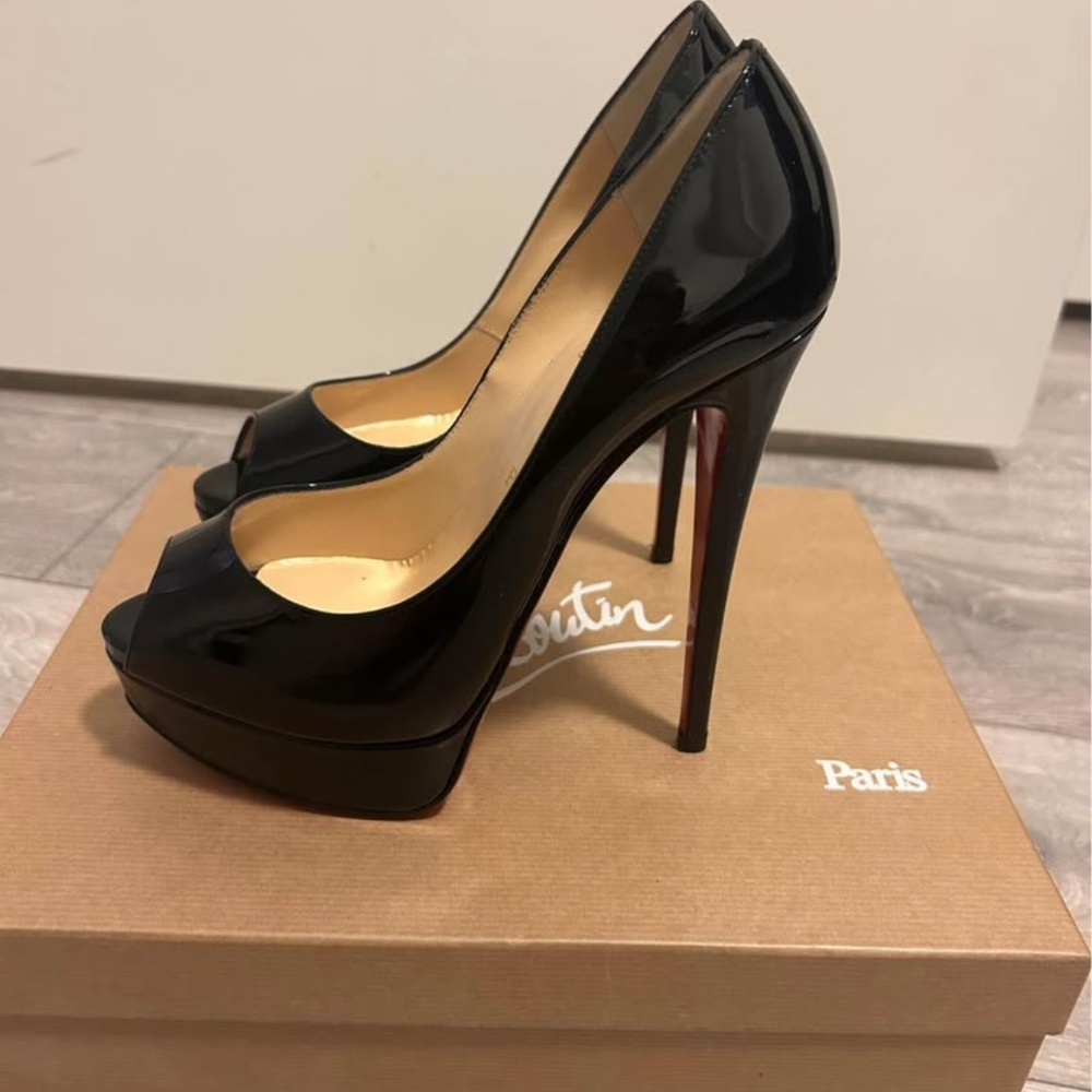 Brand new peep toe Christian Louboutins